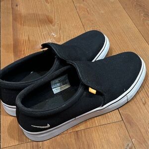 Nike Black Canvas Slip-Ons with White Sole